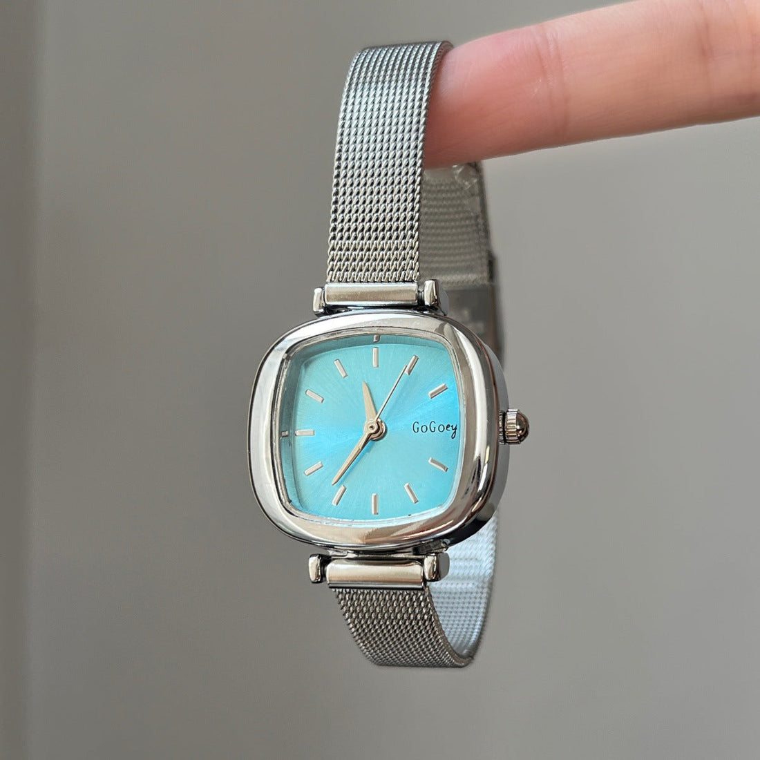 Glacier-blue square dial watch with silver-tone mesh band