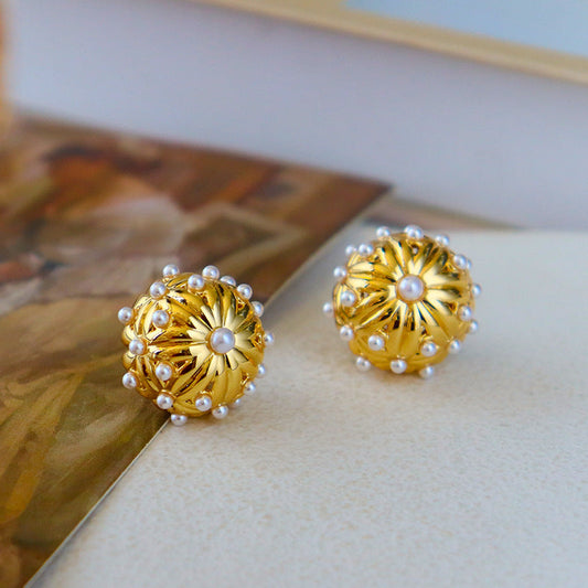 Vintage pearl flower dome stud earrings with gold-tone floral shape