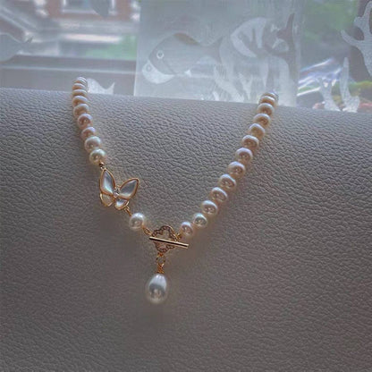 Real pearl necklace with butterfly shell