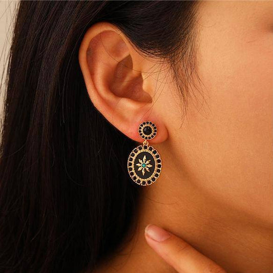 Black eight-pointed star earrings