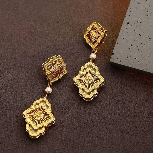 Carved earrings